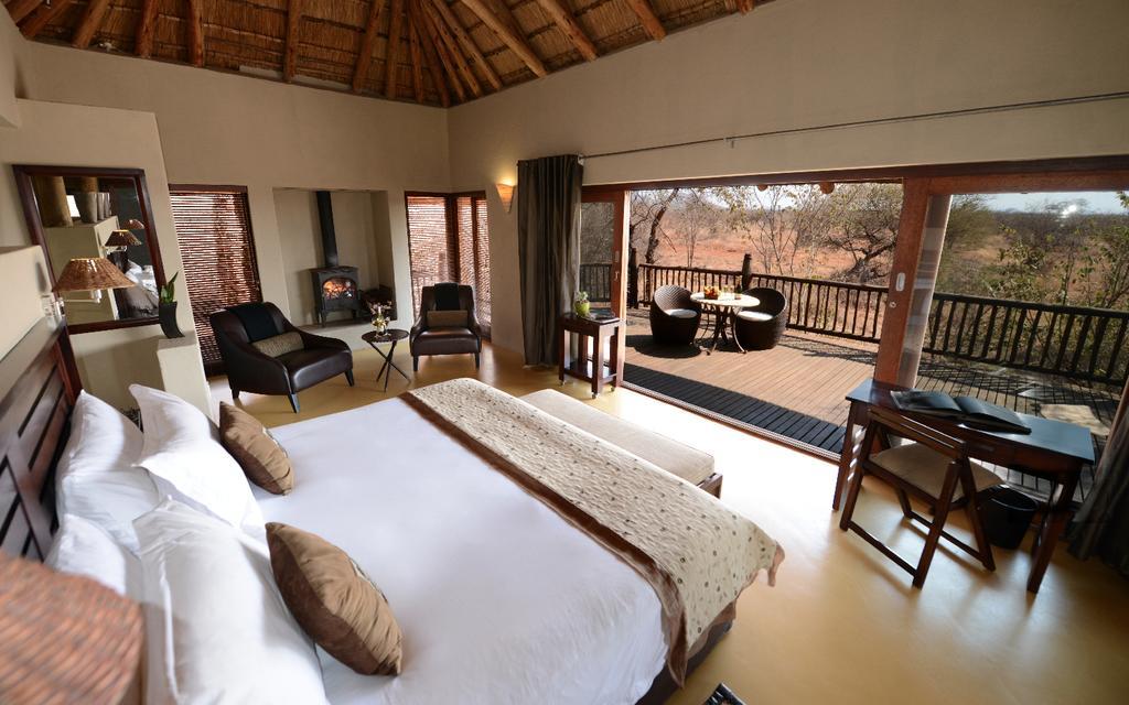 Etali Safari Lodge Мадікве-Ґейм-Резерв Номер фото